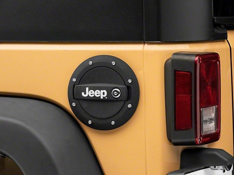 Officially Licensed Jeep 07-18 Jeep Wrangler JK Locking Fuel Door w/ Printed Jeep Logo